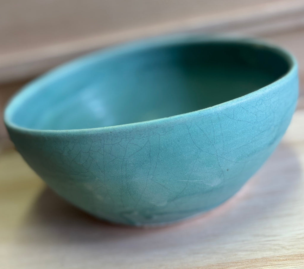 Large asymmetric serving bowl